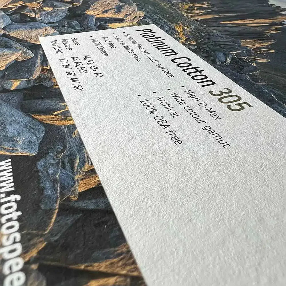 Textured Platinum Cotton 305 paper sample showcasing high D-Max, wide color gamut, and OBA-free cotton surface