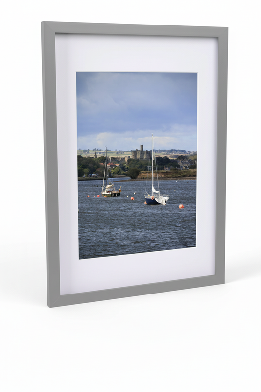 Framed fine art print of Warkworth Castle with sailboats on the river, British landscape photography